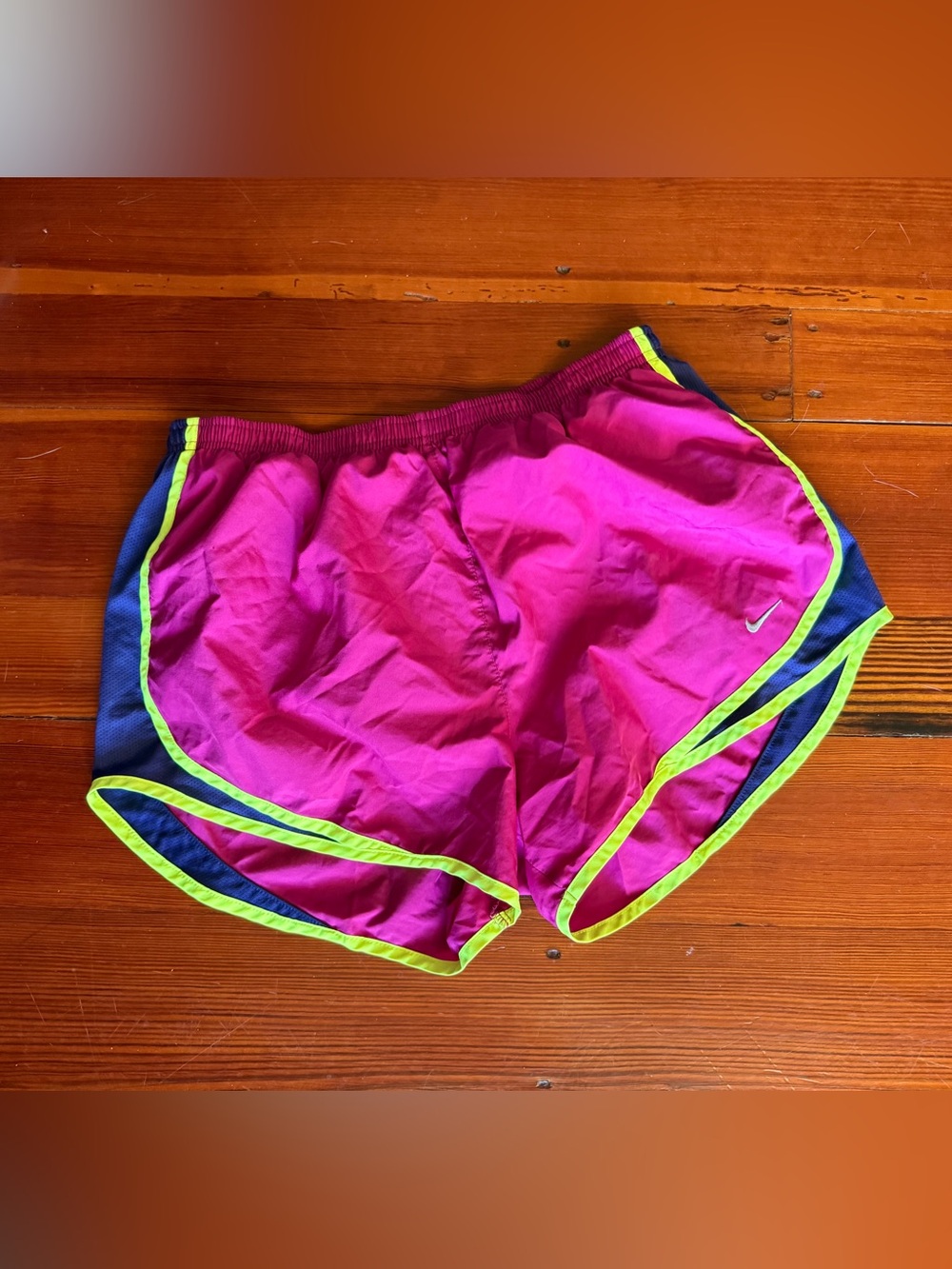 Nike Tempo running shorts, size large, fuchsia color with navy and neon yellow